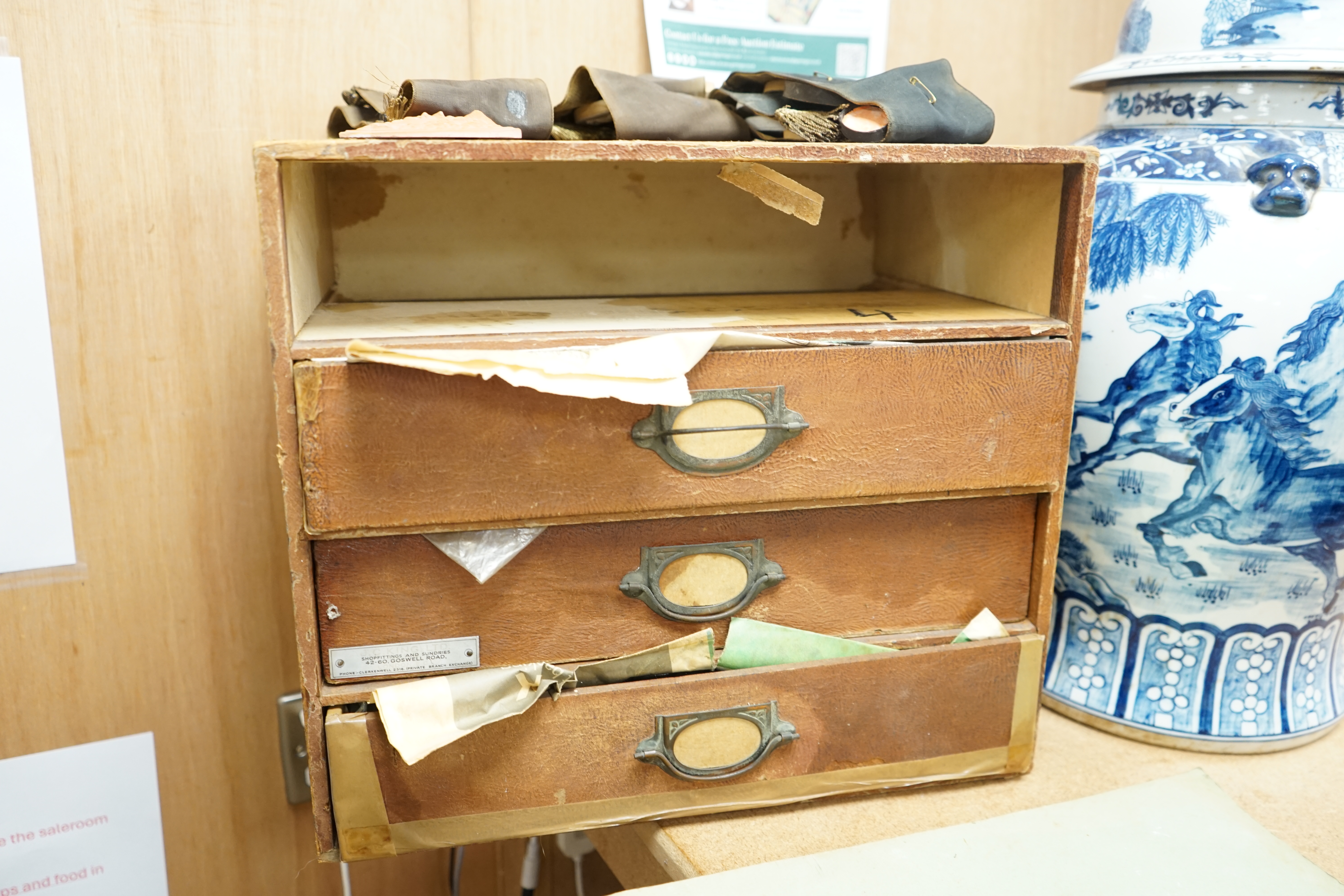 A case containing a collection of various plaster cameos and moulds. Condition - varies